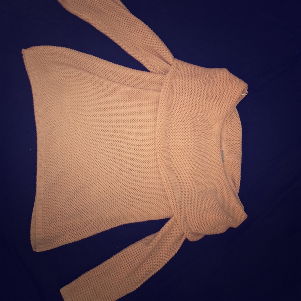 Off the shoulder sweater in a muted pink/salmon